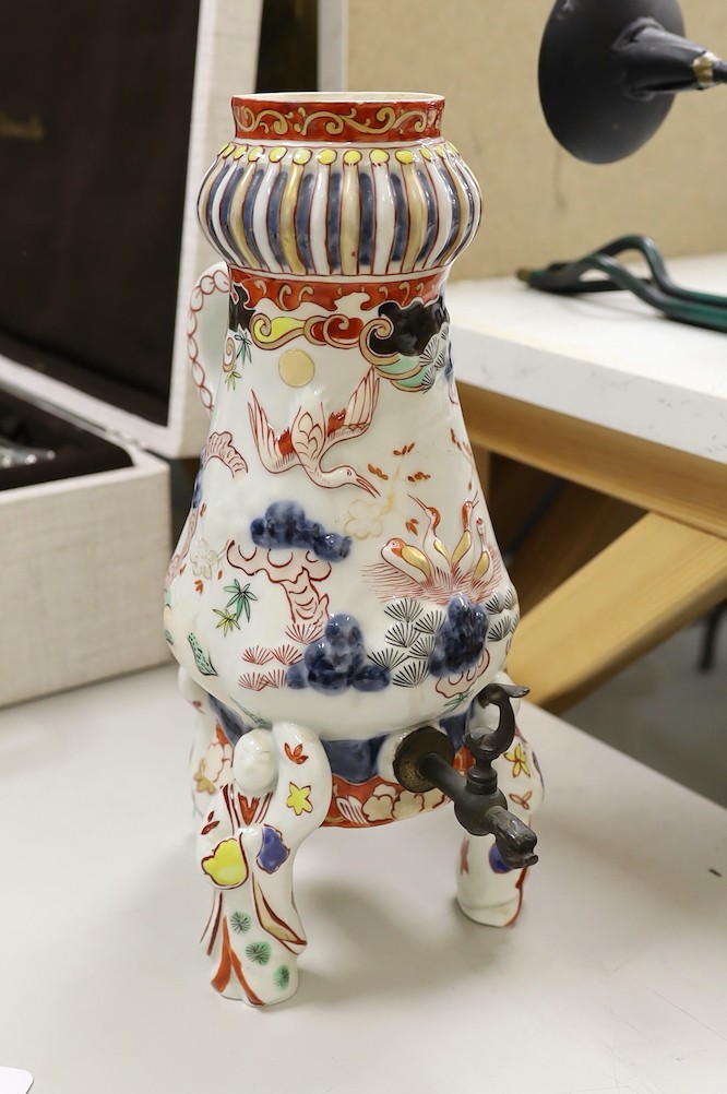 A Japanese Arita or Imari porcelain tripod urn